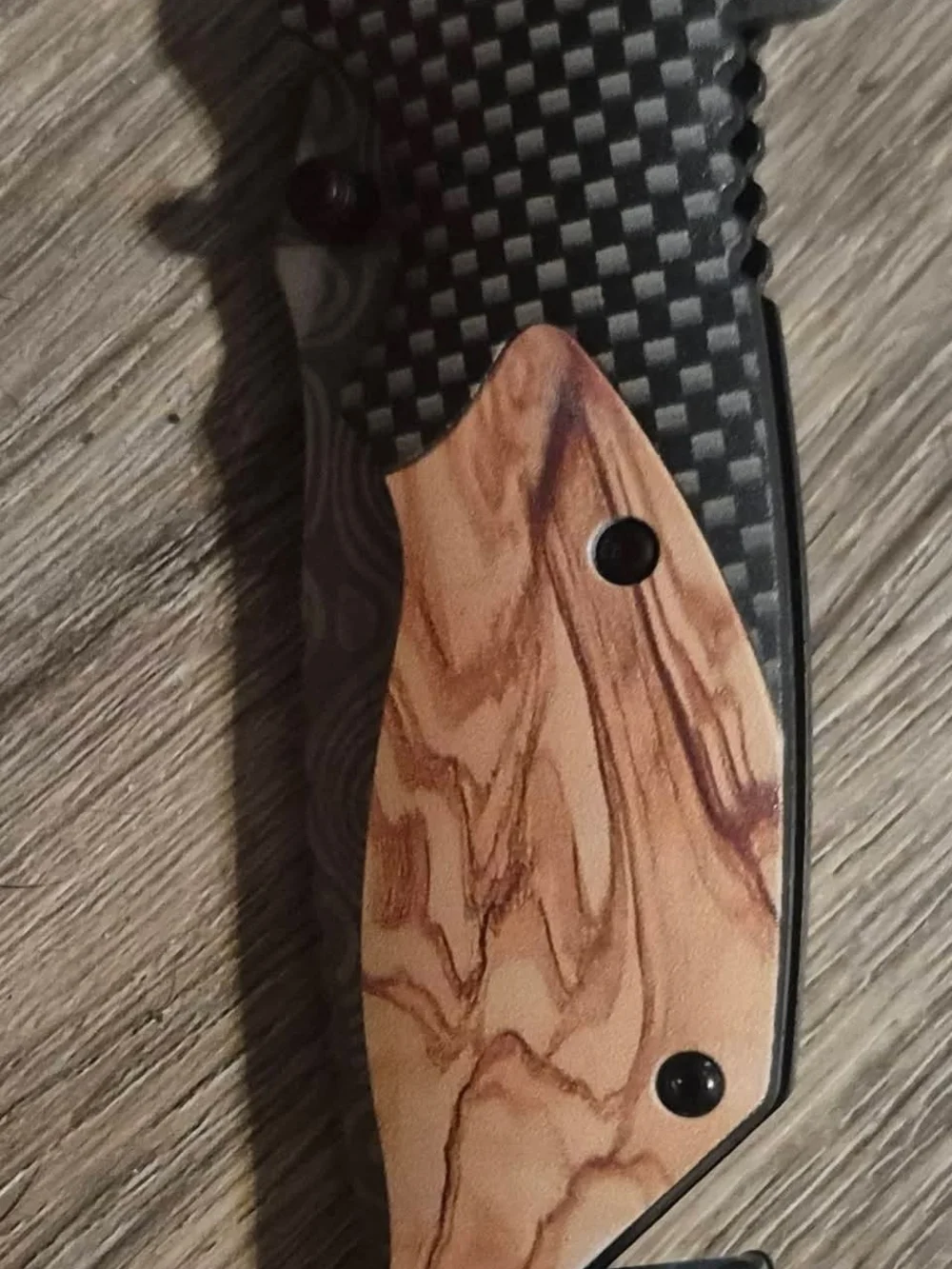 Folding Knife with Wood Grain Handle and Black Textured Frame